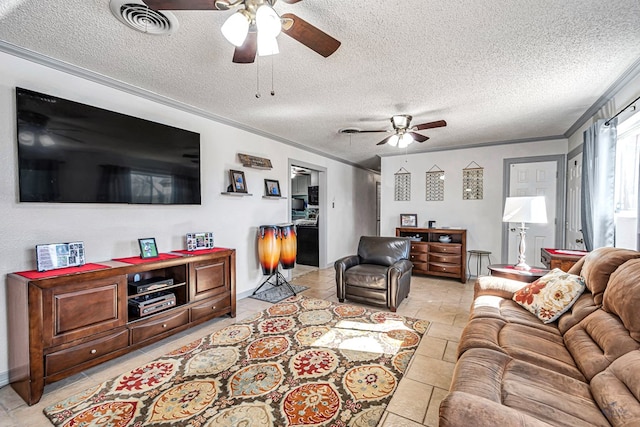 living room with ornamental molding, ceiling fan, and a textured ceiling