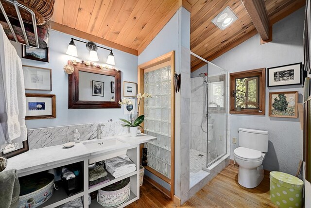 bathroom with wood ceiling, a shower with door, lofted ceiling with beams, hardwood / wood-style floors, and toilet