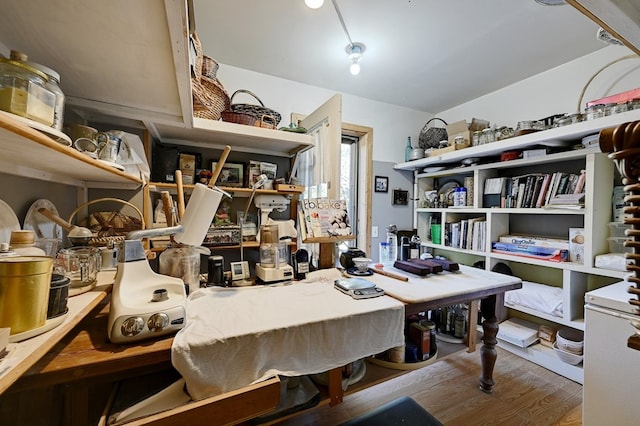 home office with hardwood / wood-style floors