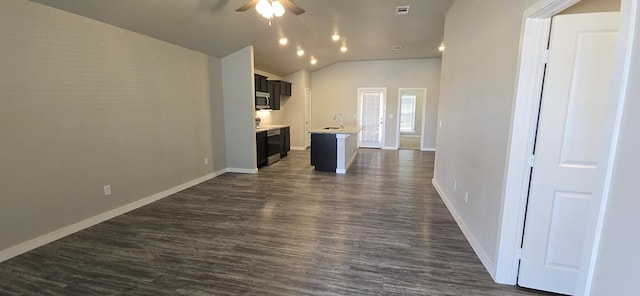 unfurnished living room featuring visible vents, lofted ceiling, dark wood-style floors, baseboards, and ceiling fan