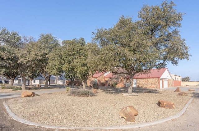 view of yard with a garage