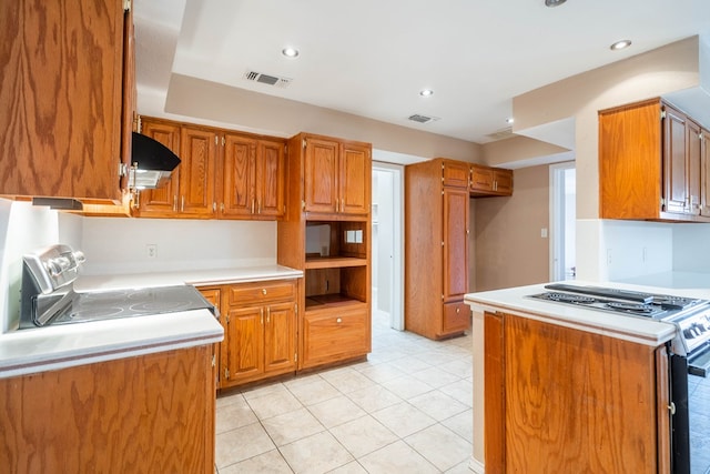 kitchen featuring electric stove, light tile patterned floors, range with electric stovetop, and range hood