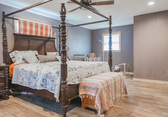 bedroom featuring ceiling fan and light wood-type flooring