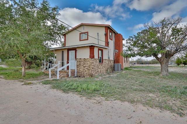 view of front of property featuring central AC