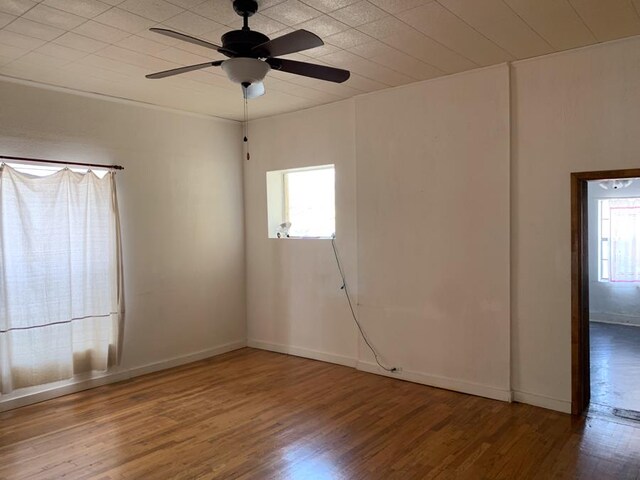 living room featuring light hardwood / wood-style flooring and ornamental molding