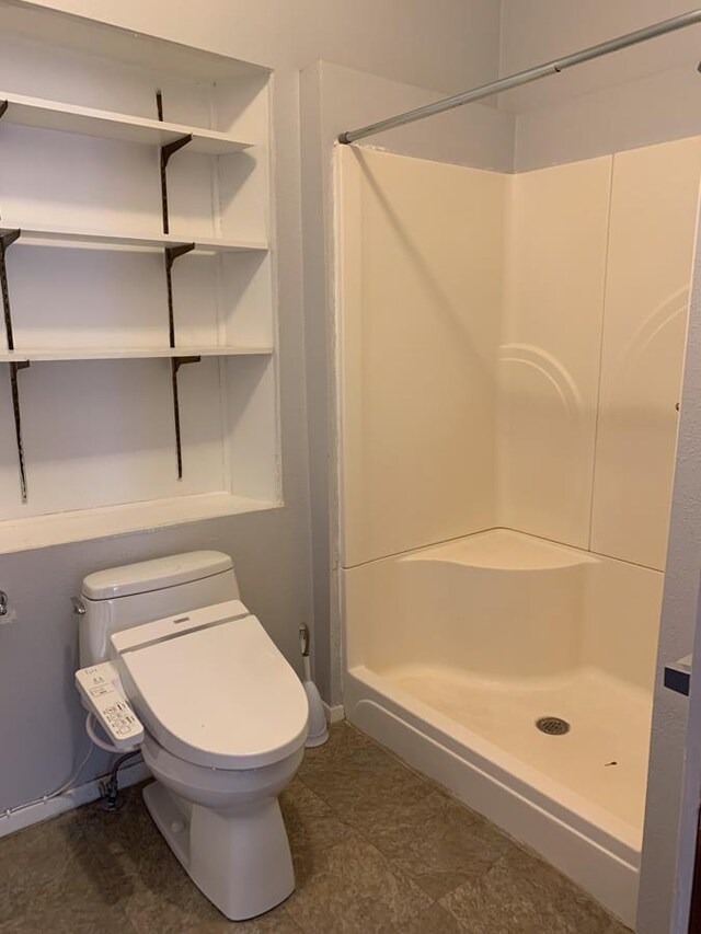 bedroom with tile patterned floors and a wall unit AC