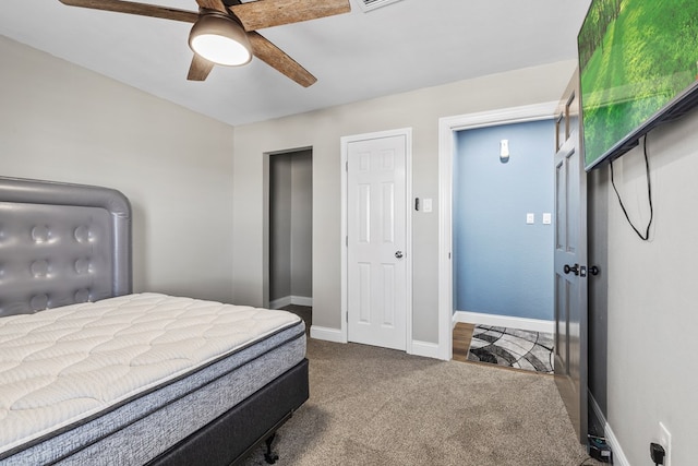 carpeted bedroom featuring ceiling fan