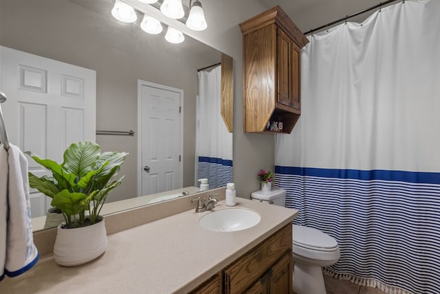 full bathroom with vanity, toilet, and a shower with curtain