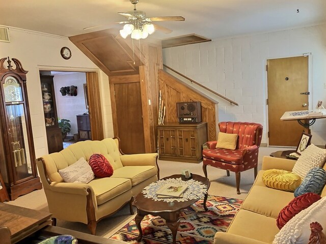 carpeted living room featuring ceiling fan