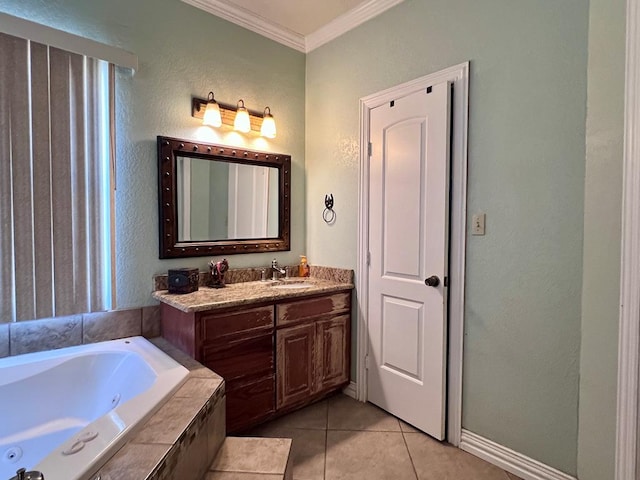 bathroom featuring ornamental molding, a jetted tub, vanity, and tile patterned floors