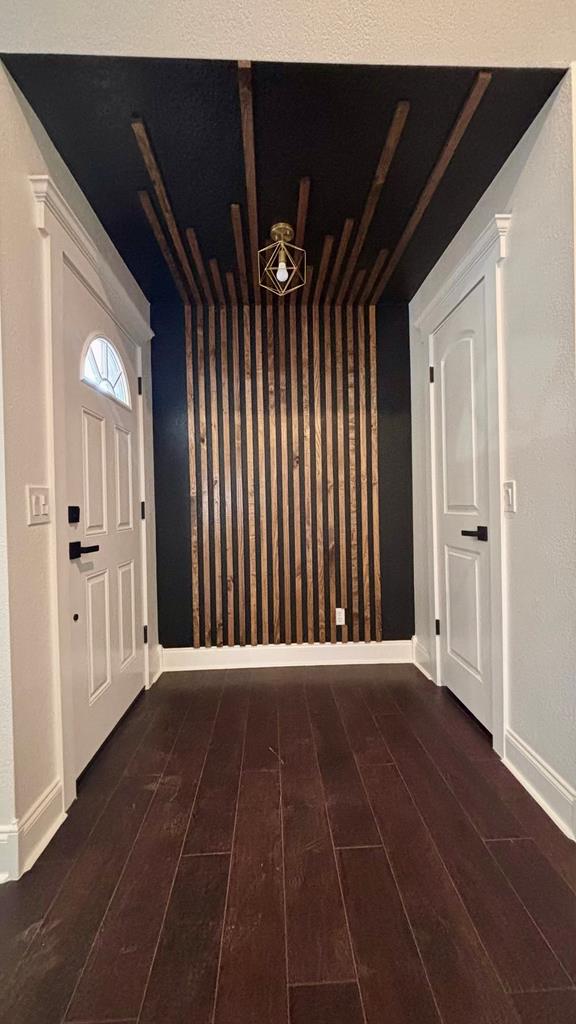 foyer featuring dark hardwood / wood-style floors