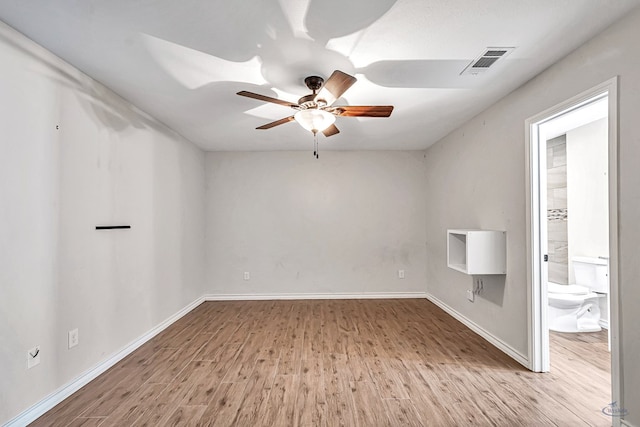 unfurnished room featuring light hardwood / wood-style floors and ceiling fan