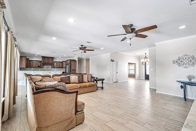 living room featuring ceiling fan with notable chandelier, light hardwood / wood-style floors, and crown molding