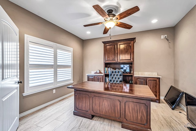 office area featuring light hardwood / wood-style floors and ceiling fan