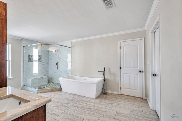 bathroom with plus walk in shower, a textured ceiling, vanity, and ornamental molding