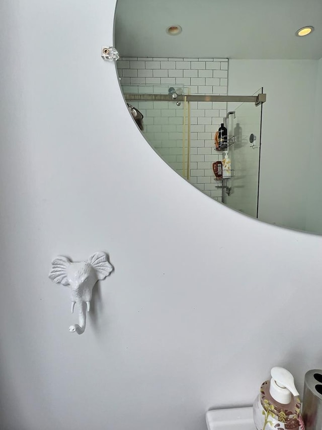 details featuring a shower with door