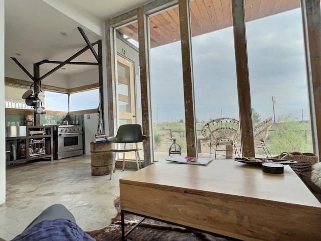 interior space featuring floor to ceiling windows and a wealth of natural light