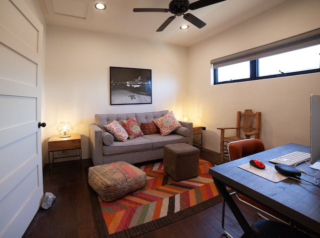 living area with a ceiling fan, hardwood / wood-style flooring, and recessed lighting