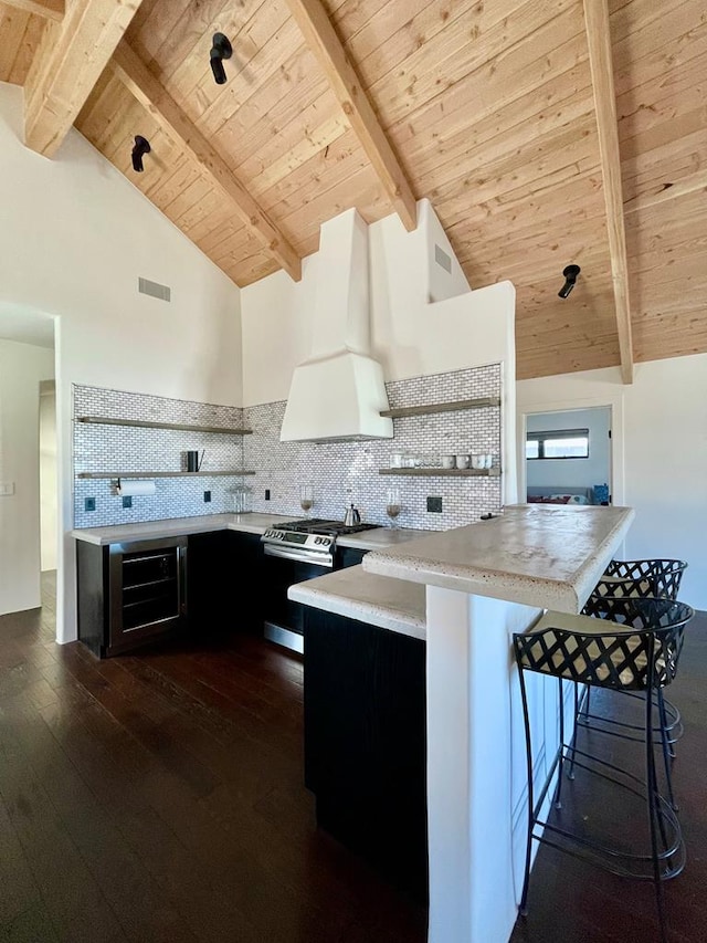 kitchen with visible vents, open shelves, decorative backsplash, light countertops, and stainless steel gas stove