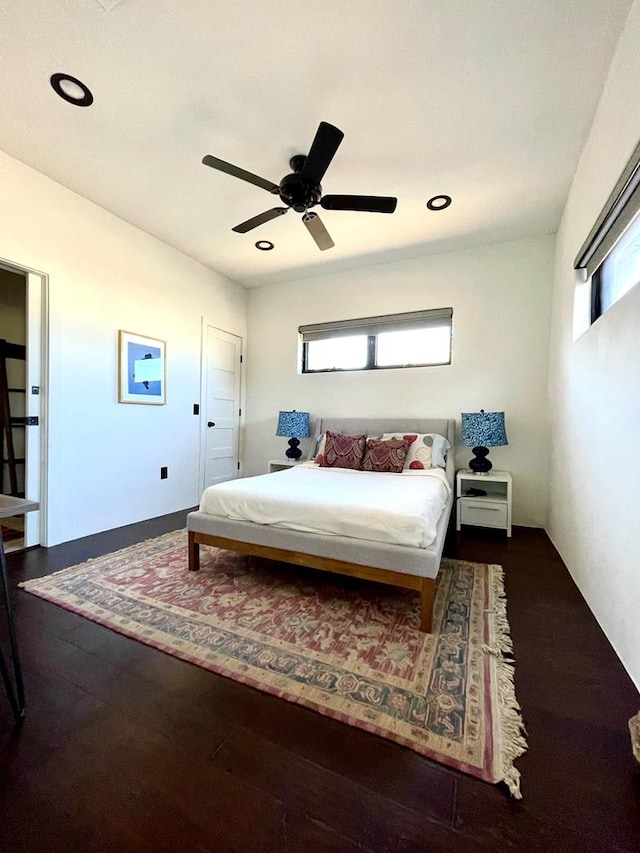 bedroom with recessed lighting, a ceiling fan, and wood finished floors