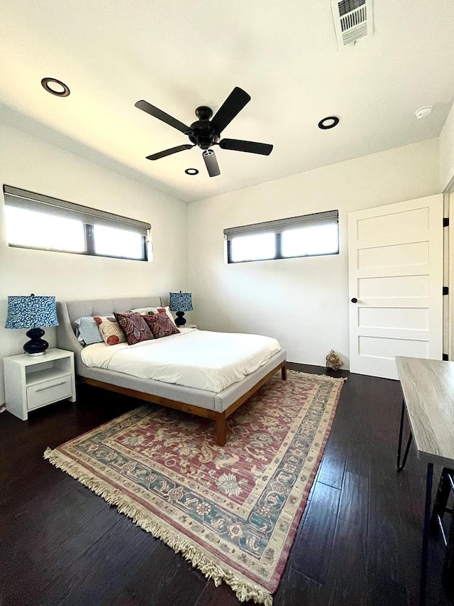 bedroom with recessed lighting, visible vents, wood-type flooring, and a ceiling fan