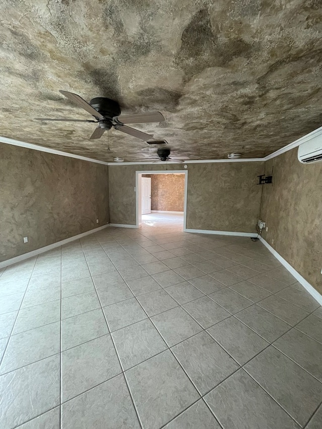 tiled spare room featuring a wall mounted air conditioner, ceiling fan, and ornamental molding