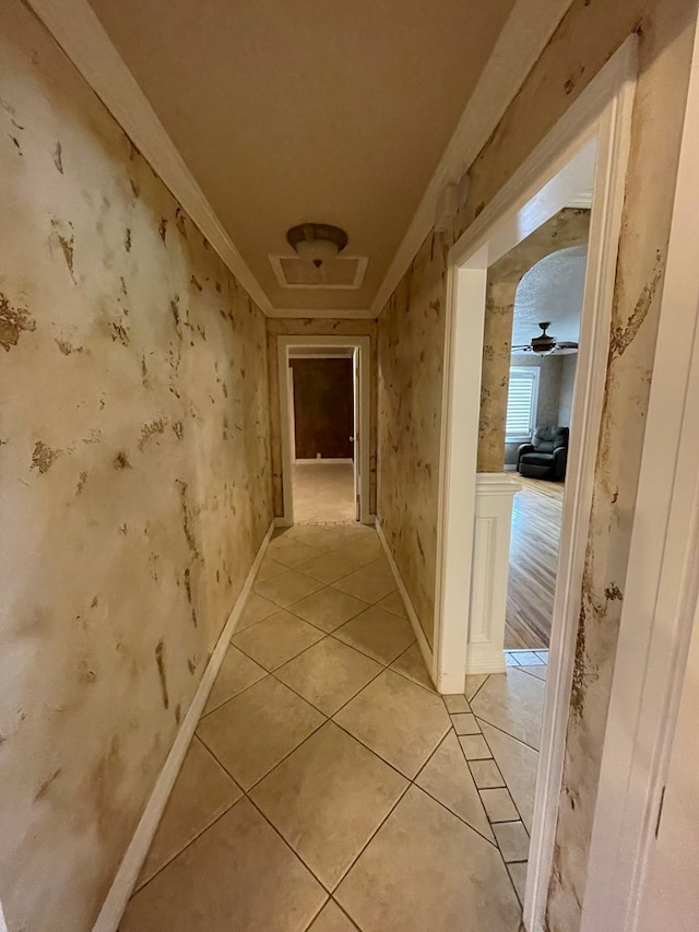 corridor featuring light tile patterned flooring