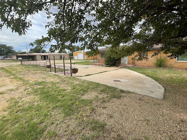 view of yard with a garage