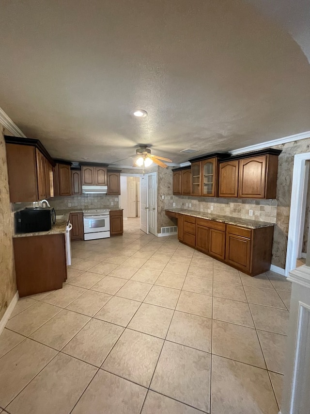 kitchen with decorative backsplash, ornamental molding, ceiling fan, electric stove, and light tile patterned flooring