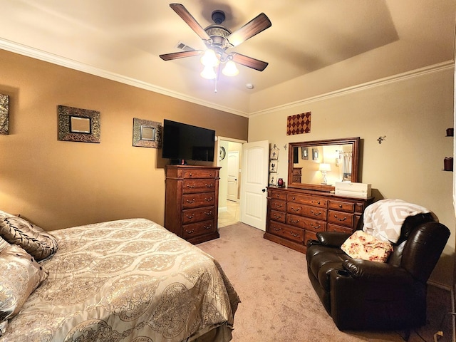 bedroom featuring crown molding, light colored carpet, and ceiling fan