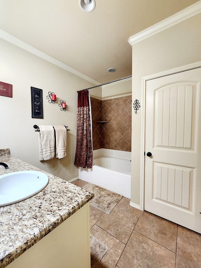 bathroom featuring tile patterned flooring, ornamental molding, shower / bathtub combination with curtain, and vanity