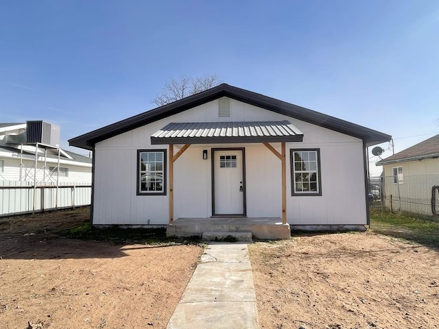 view of front of home featuring covered porch and central AC unit