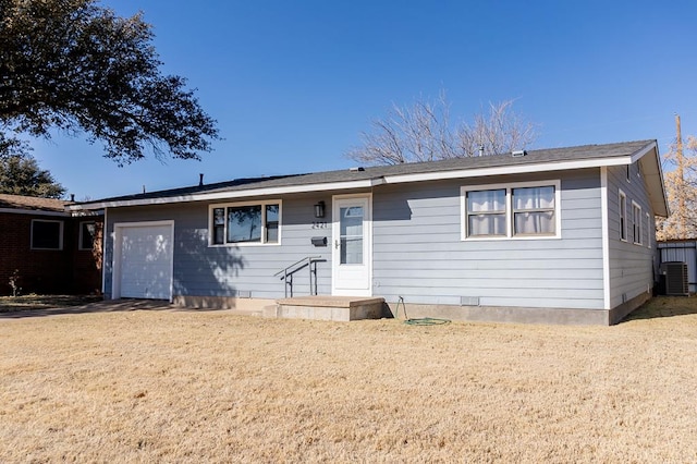 single story home with a garage and central AC