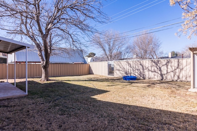 view of yard featuring a gate and fence