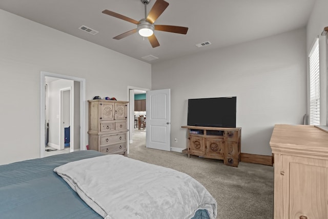 bedroom with light colored carpet and ceiling fan