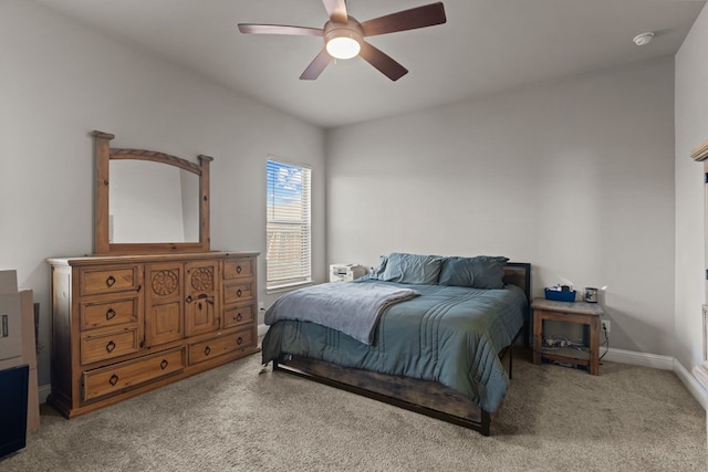 bedroom featuring ceiling fan and light colored carpet