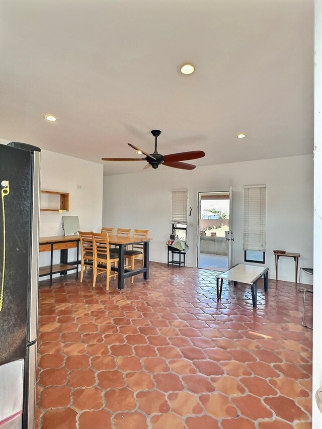 living room featuring ceiling fan