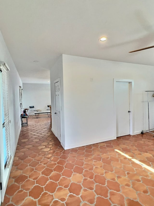 hallway featuring a wealth of natural light