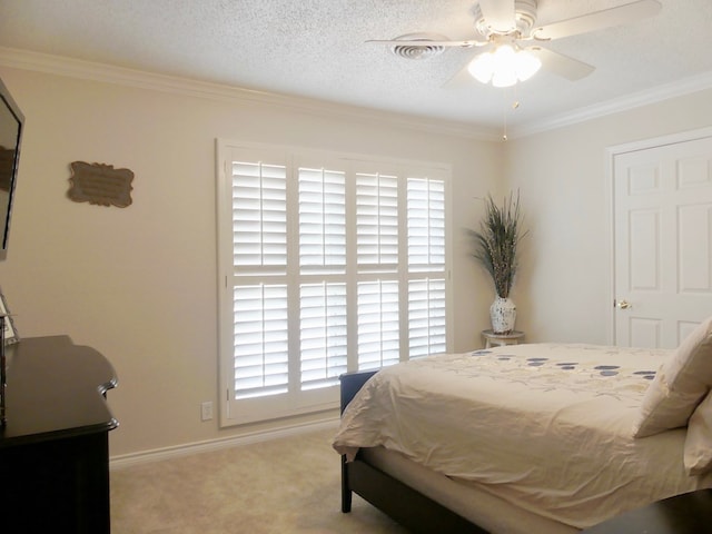 carpeted bedroom featuring ceiling fan, crown molding, and multiple windows