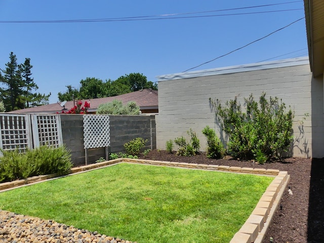 view of yard with fence