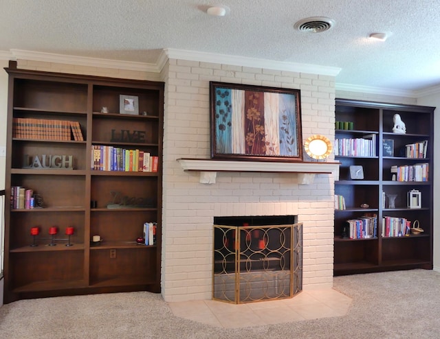 living area featuring a fireplace, crown molding, visible vents, carpet flooring, and a textured ceiling