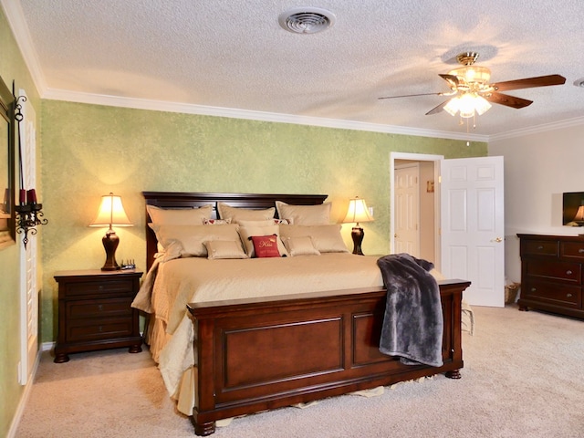 bedroom with a textured ceiling, light carpet, visible vents, a ceiling fan, and crown molding