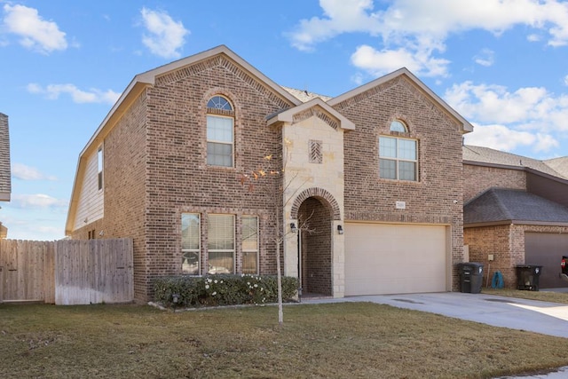 view of front of house with a garage and a front lawn