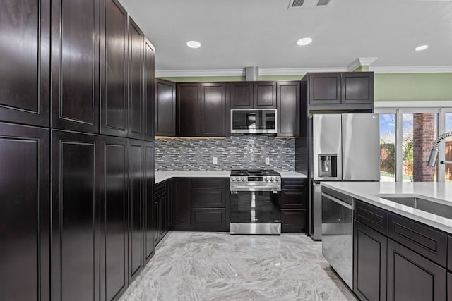 kitchen with dark brown cabinetry, sink, stainless steel appliances, backsplash, and ornamental molding