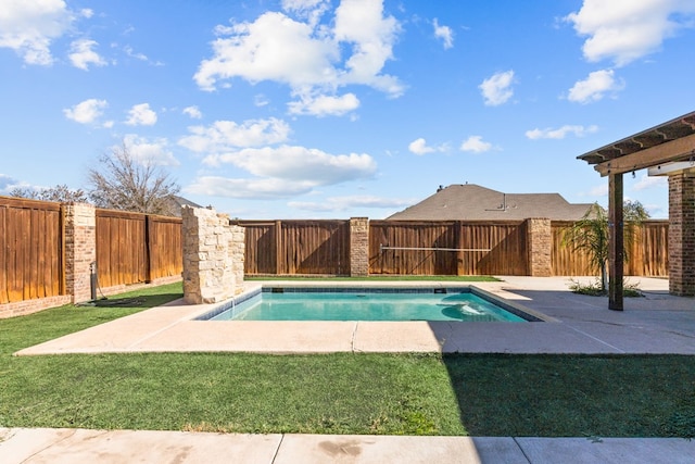 view of swimming pool featuring a patio area and a lawn