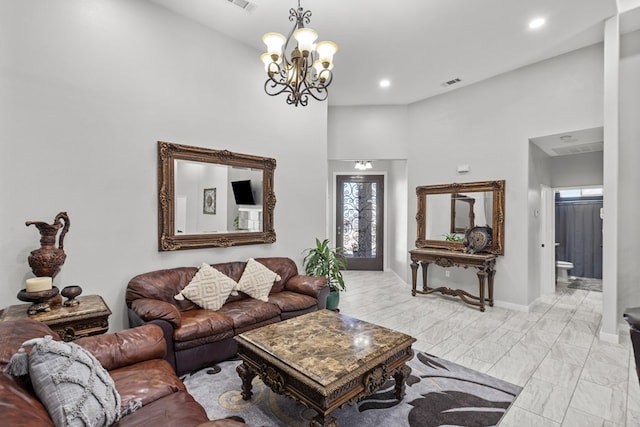 living area with recessed lighting, a notable chandelier, visible vents, baseboards, and marble finish floor