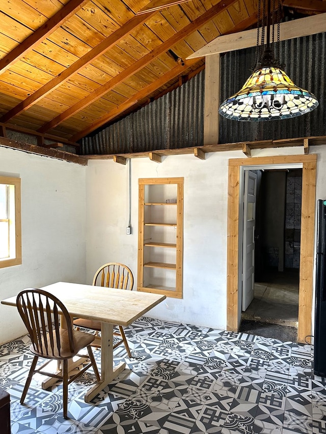 dining area with wooden ceiling and lofted ceiling with beams