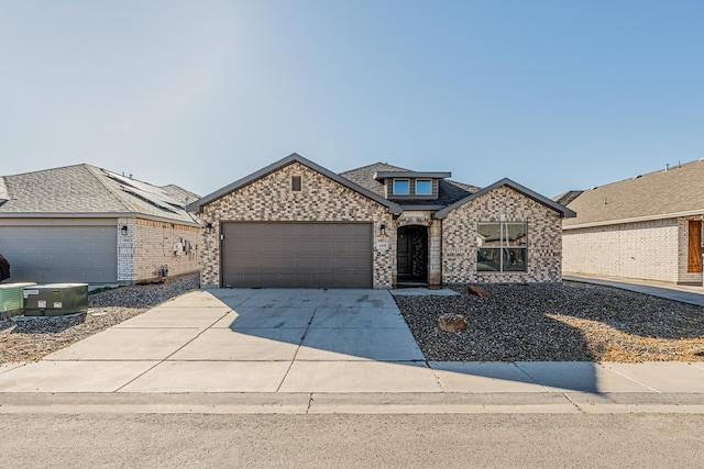 view of front of property featuring a garage