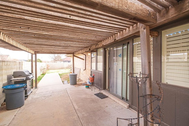 view of patio / terrace with a pergola and area for grilling