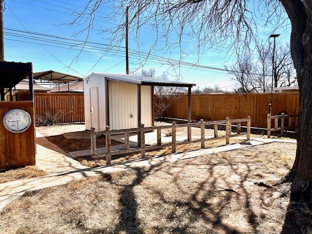 exterior space featuring a storage unit